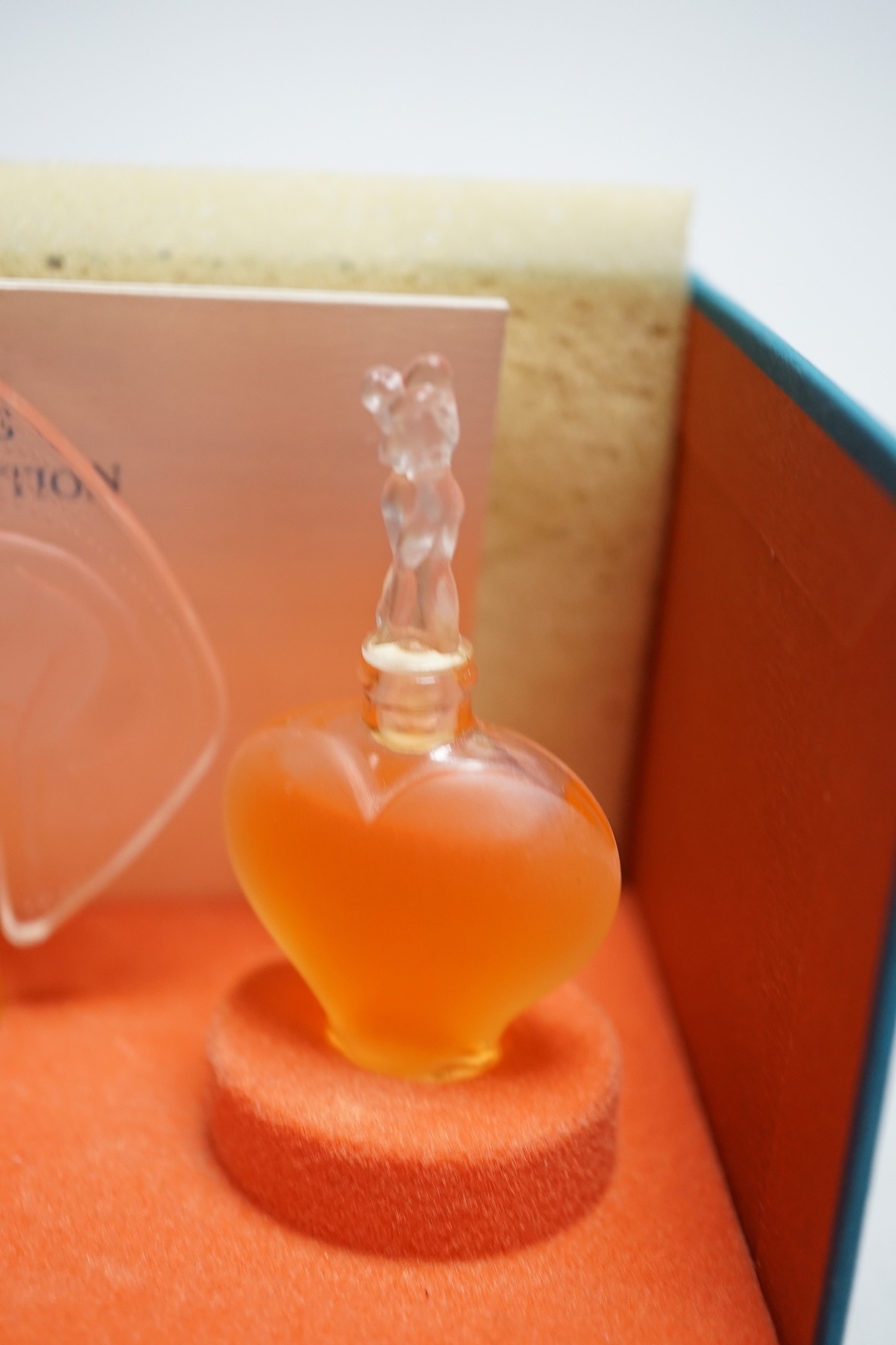 A boxed Lalique Les Introuvables perfume set